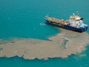 ship discharging effluent at sea