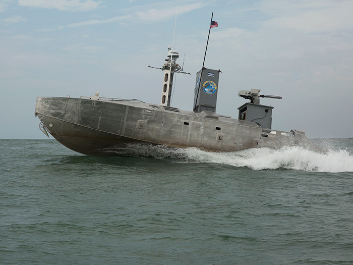 Marine Corps places weaponized unmanned vessel via its speeds image description