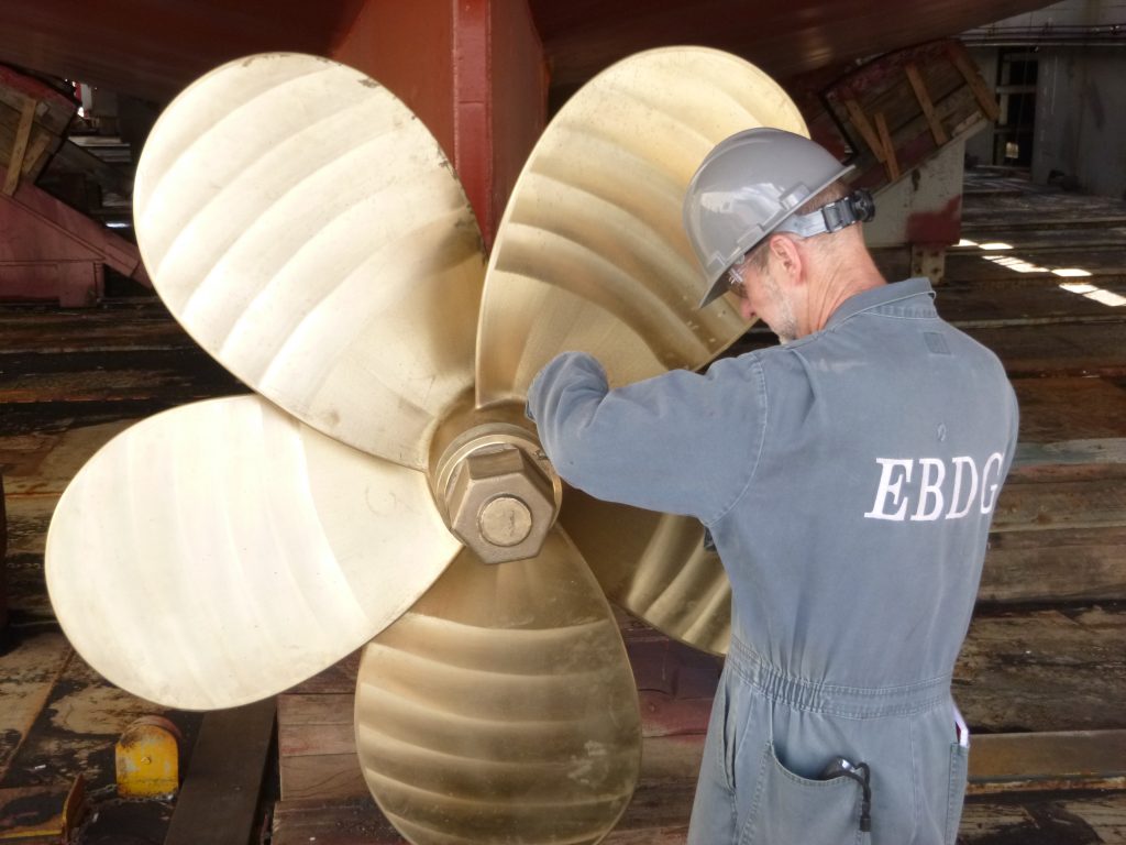 Brian King examines the propeller of an EBDG-designed vessel.
