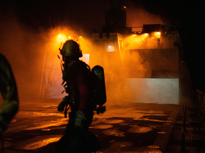 Coast Guard cutter team fights shipboard fire image description