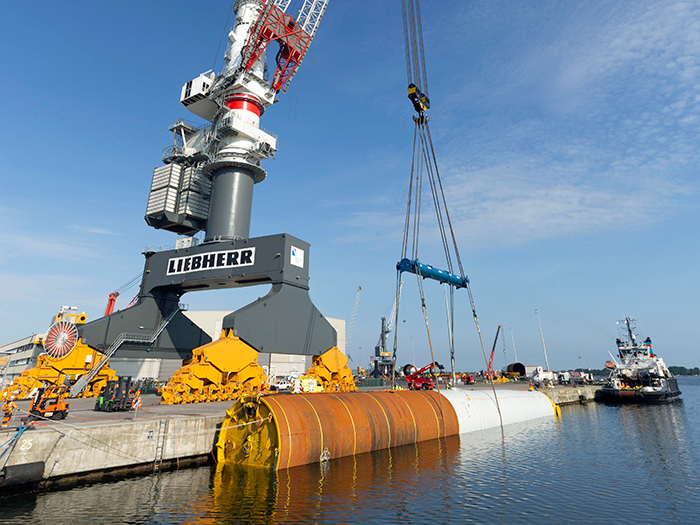 Liebherr durable crane lots offshore wind monopiles in Rostock image description