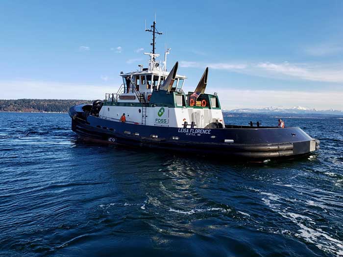 Tugboat seen from three-quarters astern