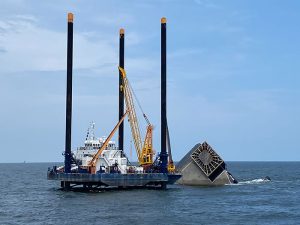 SEACOR Eagle lift boat near capsized SEACOR PowerOR Eagle