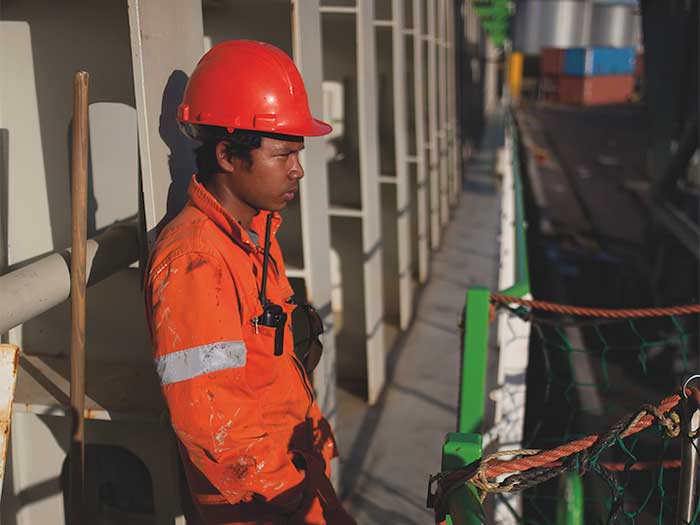 Seafarer in red suit