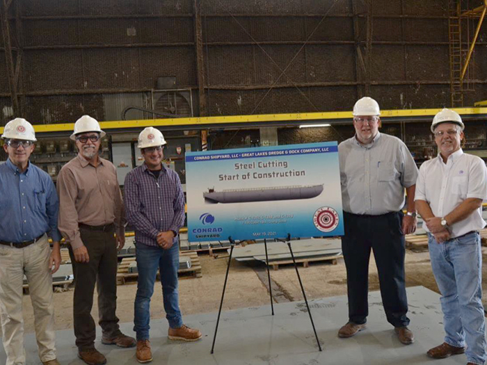 Attendees at dump scow barge steel cutting