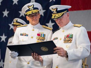 Rear Adm. John P. Nadeau (left) transferred command of the Coast Guard 8th District to Rear Adm. Richard V. Timme.