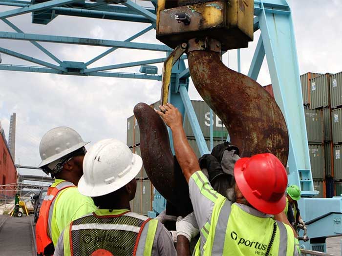 men in hard hats at terminal