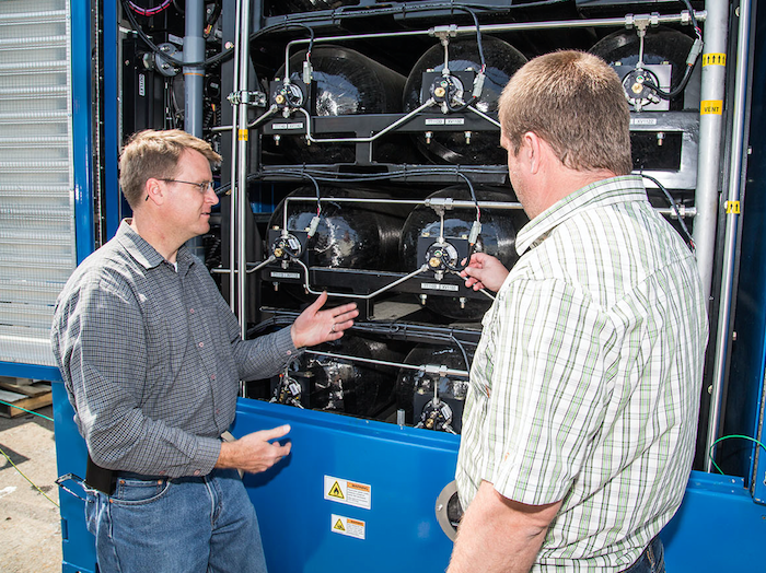 ZEI's CEO and CTO Dr. Joseph Pratt, formerly at Sandia National Labs, analyzes the hydrogen storage system found within the fuel cell unit of the Maritime Hydrogen Fuel Cell Generator Project.