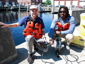 Two men with ROV at Norfolk Naval Shipyard