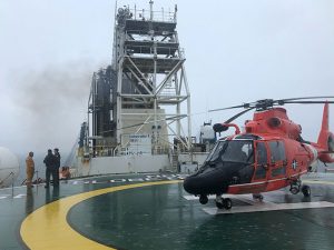 Helicopter on drillship helipad