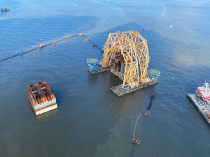 Heavy lift vessel holds section of Golden Ray wreck