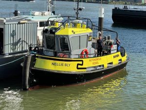 Autonomous tugboat at quayside