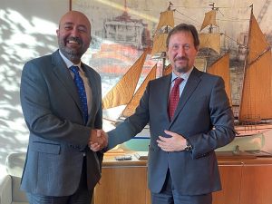 Handshake seals Tier III tugboat deal