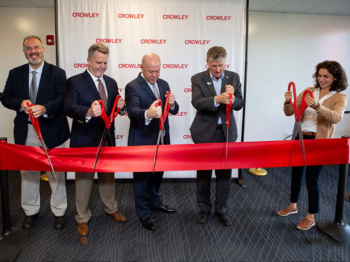 ceremonial ribbon cutting marked opening of ne Crowley office