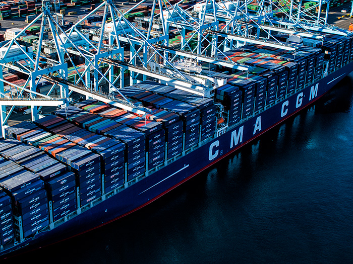 Containership with CMA CGM logo on side