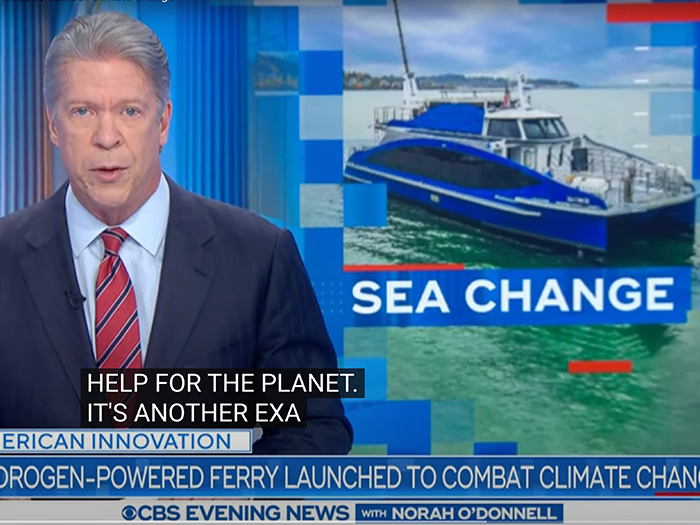 Screen shot of CBS news anchor with Sea Change ferry