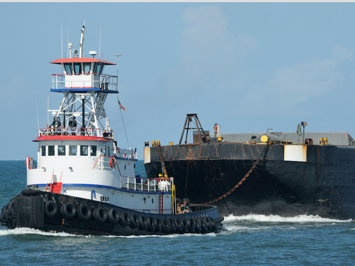 workboat pulling barge