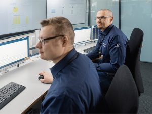 Maintenance techs in control room