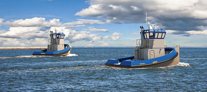 Two truckable tugs on water