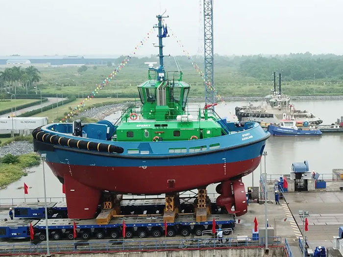 All-electric tug at shipyard