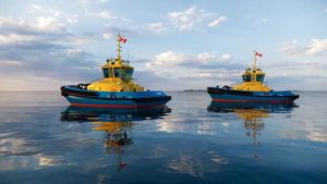 two all-electric tugs