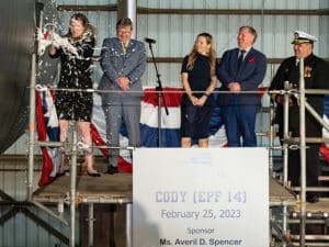 Expeditionary Fast Transport (EPF) USNS Cody was christened by sponsor Averil D. Spencer with a ceremonial champagne bottle-break on its bow.