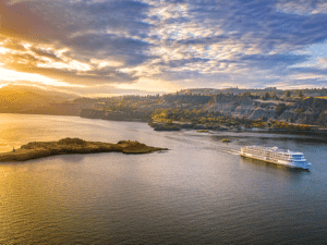 American Song river cruise ship travels down the Snake River.