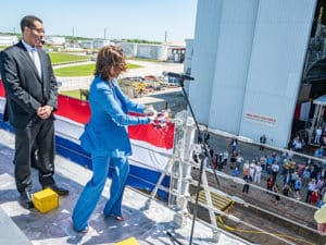 Ship's sponsor breaks bottle on bow of USS KIngsville (LCS 36)