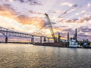 Liebherr crawler crane being used for dredging