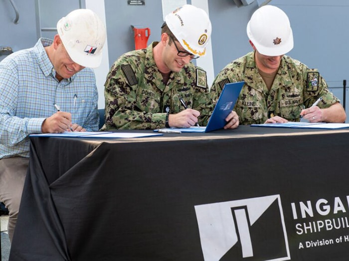 Signing ceremony for acceptance of first Flight III destroyer
