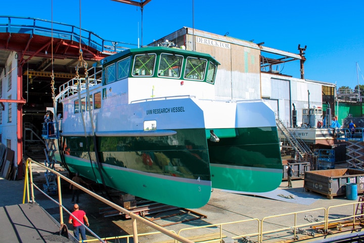 hybrid research catamaran seen leaving building hall