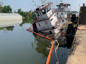 partially sunken towboat
