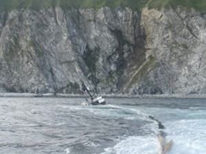 fishing vessel grounding and capsizing came afyer it struck a submerged