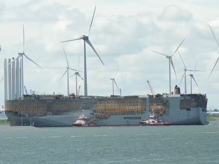 Burned out car carrier