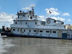 towboat grounded after pilot left helm