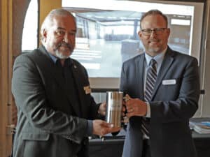 Wim Dillen, international development manager for Port of Antwerp-Bruges (L) was presented with Ports of Indiana’s Steel Stein by Ports of Indiana CEO Jody Peacock.