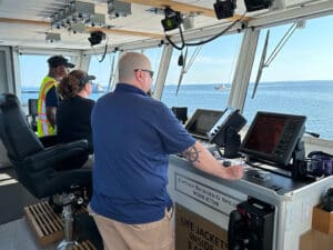 Seaward Services guy on ferry bridge