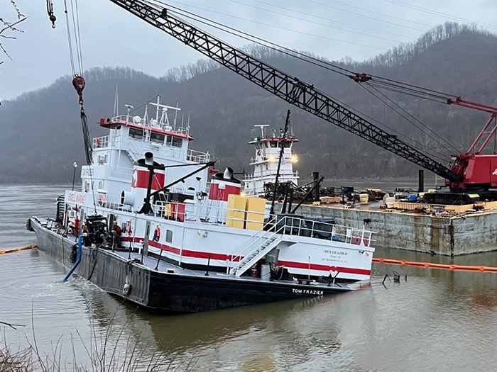 Tom Frazier aground and listing to starboard on Feb. 11, 2024. [Photo: U.S. Coast Guard]