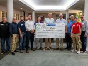 Soybean farmers with giant ch