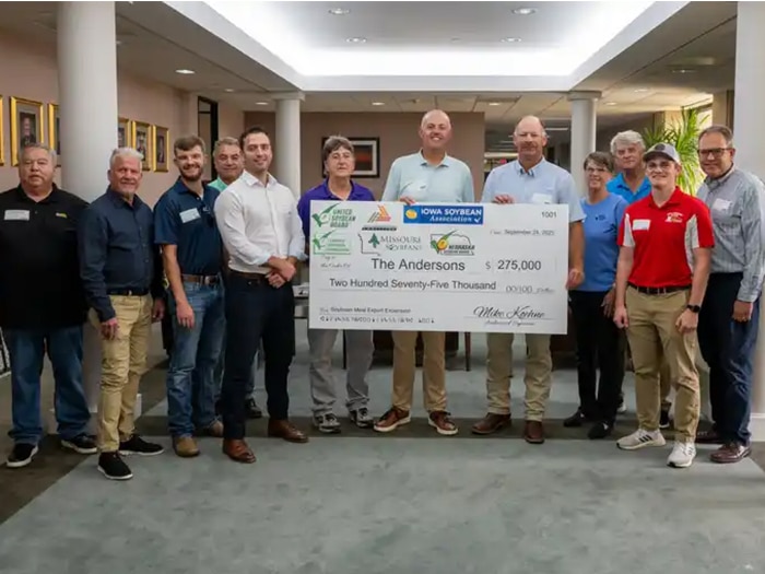 Soybean farmers with giant ch