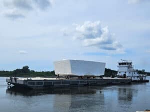 A grand block for DDG 135 was transported by barge to Ingalls after being constructed, inspected and accepted at Eastern Shipbuilding Group’s Nelson Street shipyard in Panama City, Fla. [Photo: ESG]
