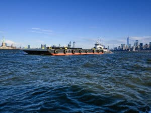 J.F. Brennan Co. christened its newest barge, the Michael Turner, on September 20 in honor of a late superintendent whose leadership and spirit left a lasting mark on the marine construction firm.