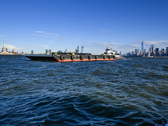 J.F. Brennan Co. christened its newest barge, the Michael Turner, on September 20 in honor of a late superintendent whose leadership and spirit left a lasting mark on the marine construction firm.