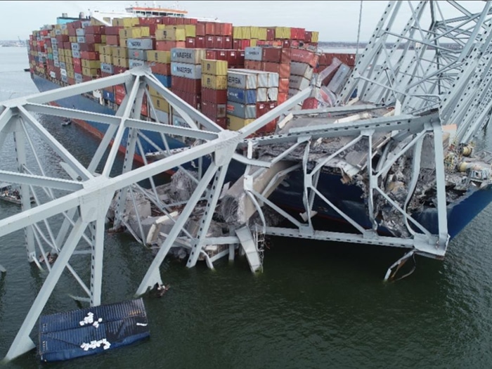 The containership Dali with portions of the collapsed Francis Scott Key Bridge across its forward deck on March 28, 2024. (Source: NTSB)
