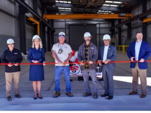 Maritime industry leaders, civic and government representatives, and guests joined Colonna’s Shipyard employees and apprentices during the ribbon-cutting ceremony for the company’s new Trades Training Building in Norfolk, Va., on Oct. 31, 2025. L to R: Reanna Gallegos, production manager, CSI Waterfront operations; U.S. Rep. Jen Kiggans (R.–Va.); Kevin Callis, CSI outside machine shop foreman; Kenny Caudle, CSI pipe shop foreman; U.S. Rep. Bobby Scott (D–Va.); Jordan Webb, CSI president. [Photo: CSI]