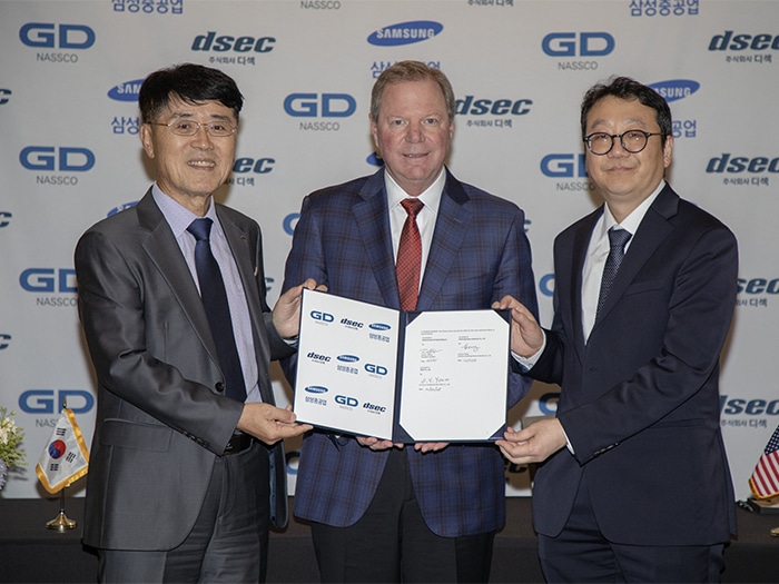 L to R: Mr. Seogyong (SY) Youn, DSEC president; Dave Carver, NASSCO president; Mr. Joonyun Kang, Samsung director of the eco business team. [Photo: GD NASSCO]