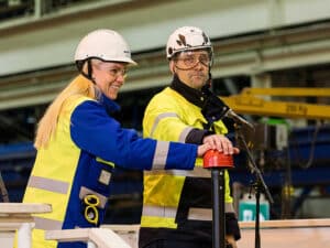 Meyer Turku project manager Noora Maunila and Royal Caribbean project manager Janne Auvivinen start the production of Icon class 5. [Photo: Meyer Turku]