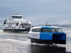 Candela P-12 on the Oslofjord, passing one of the traditional electric vessels already in operation in Norway's capital. [Photo: Candela]