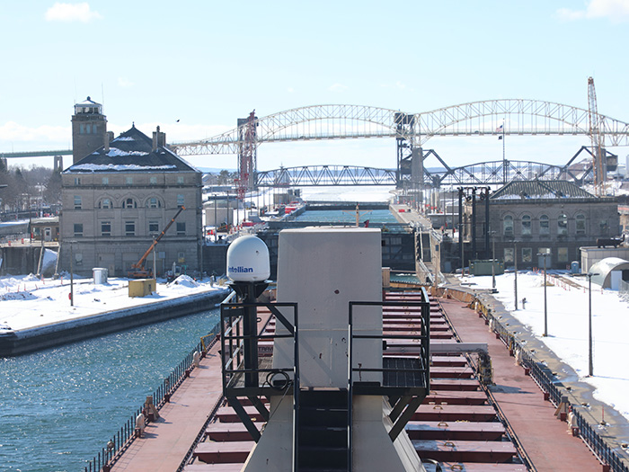 The tug/barge Clyde S. VanEnkevort/Erie Trader waits to make its way into the Poe Lock at the Soo Locks in Sault Ste. Marie, Mich. on March 14, 2025, for the opening of the Soo Locks.