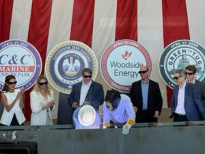 Louisiana Gov. Jeff Landry welded four specially minted doubloons into the hybrid escort tug keel — one for each project partner. [Photo: C&C Marine & Repair]